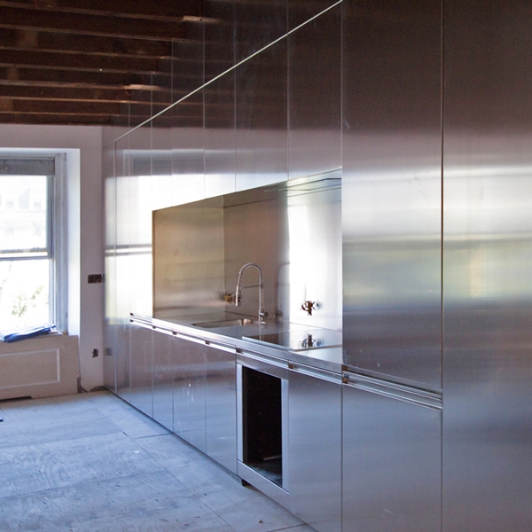 A kitchen entirely steel covered