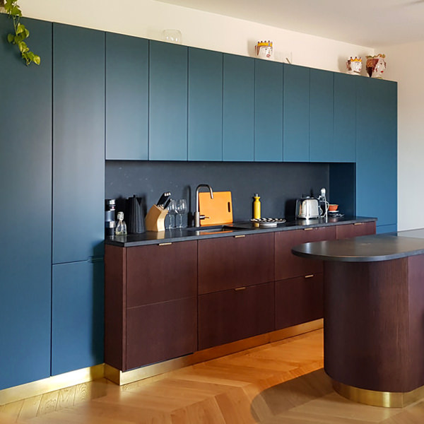 A cerulean blue modern kitchen