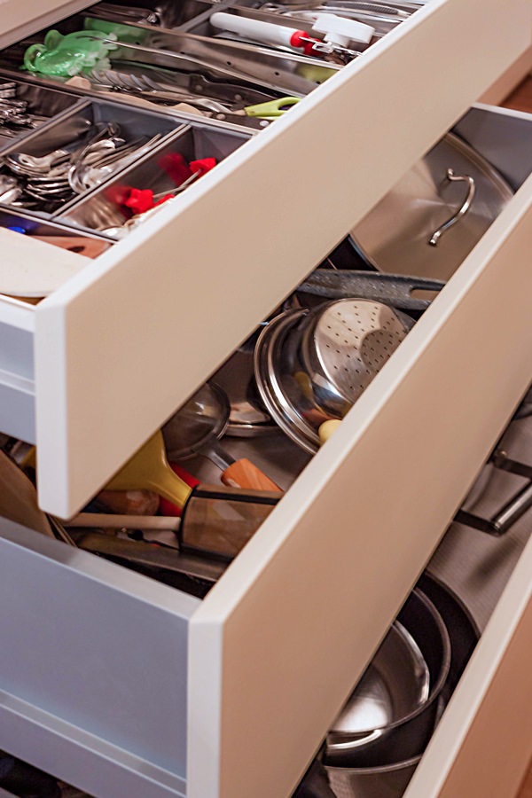 opening kitchen drawers inside aluminum cutlery tray