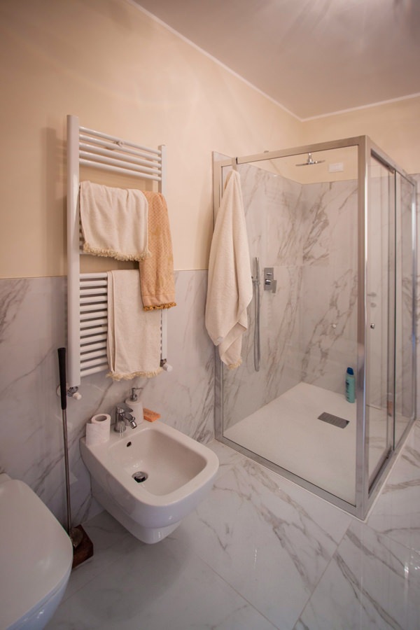 elegant master bathroom with crystal shower view