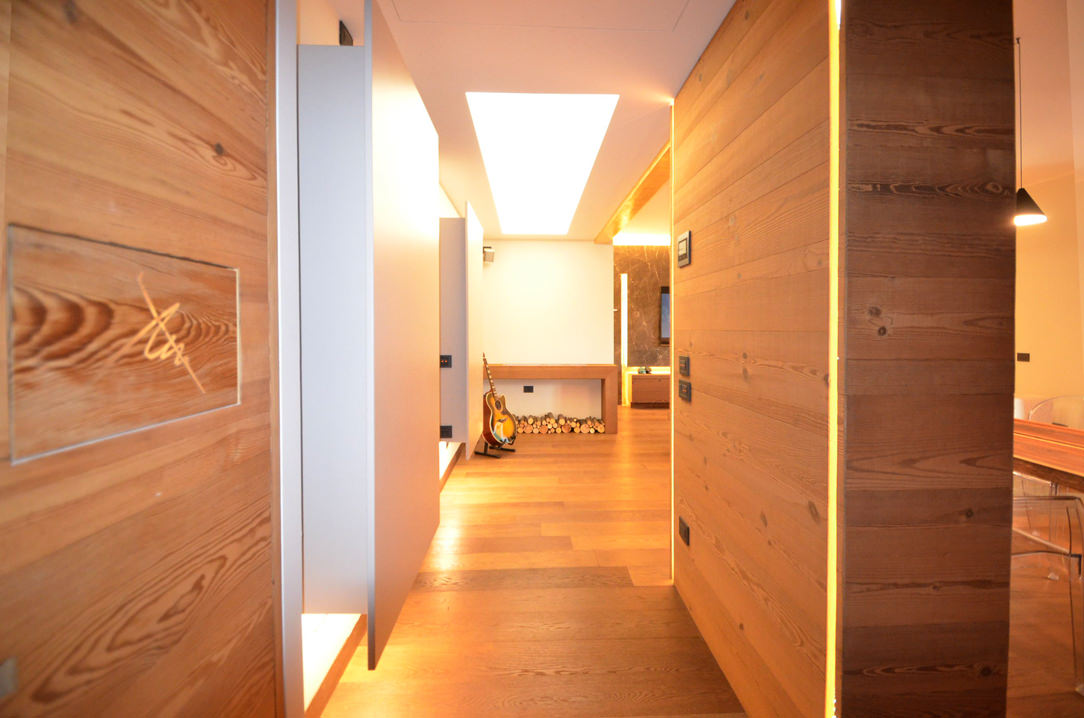corridor with high wooden paneling
