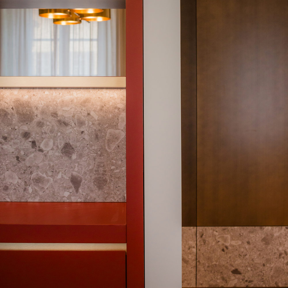 Material Harmony in the Heart of Como with Ceppo di Gre and Metallic Finishes